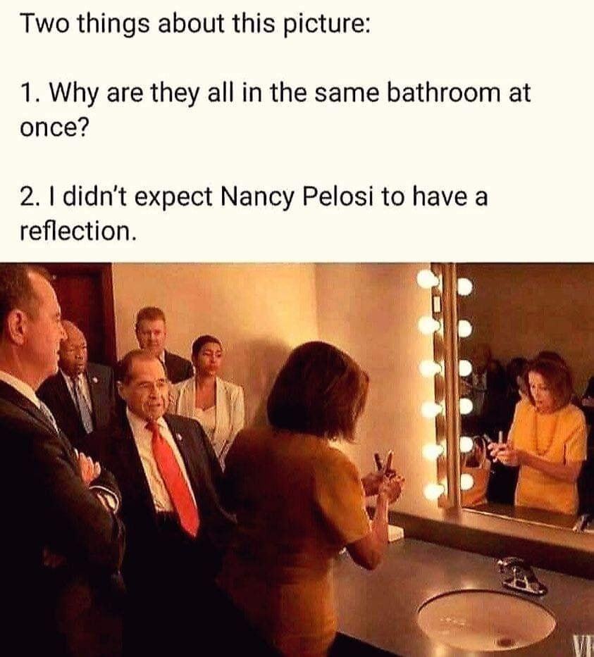Did not expect Nancy Pelosi to have a reflection in mirror